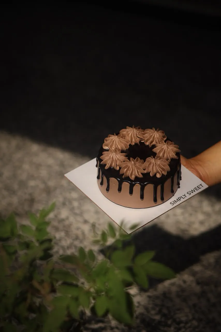 Designer chocolate cake by Simply Sweet Udaipur